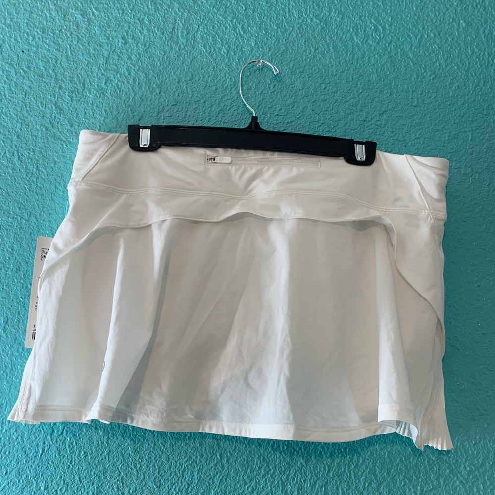 Lululemon Play Off the Pleats Skirt. Never worn, tags attached! Size 12
